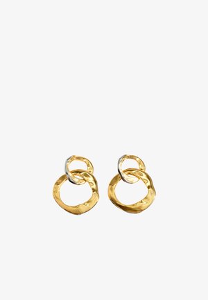 Gold and silver earrings featuring linked, textured circular shapes with a polished finish; one ring smaller and overlapping the larger one.