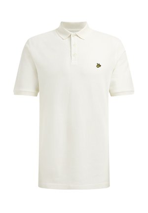 Polo de algodón color blanco roto con cuello clásico. Presenta tres botones y un pequeño emblema amarillo en el lado izquierdo del pecho. Mangas cortas.