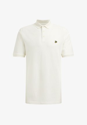 Polo tričko v odtieňoch off-white z bavlny s klasickým golierom. Obsahuje tri gombíky a malé žlté emblémy na ľavej strane hrude. Krátke rukávy.