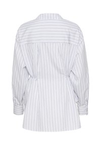White long-sleeve shirt with vertical blue and green stripes, featuring a back yoke, pleats, and buttoned cuffs. Clean, tailored design.