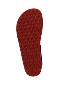 Rubber sandal sole in red with a textured pattern featuring raised wave-like shapes for enhanced grip. Rounded toe design, smooth edge.