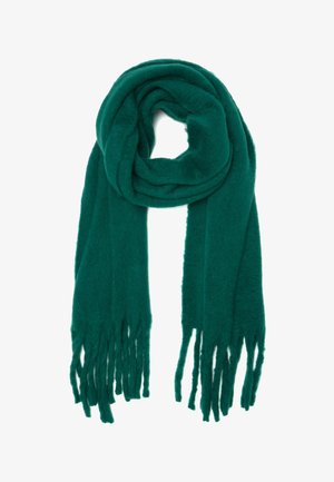 Sciarpa di lana verde, texture morbida, bordi sfrangiati, avvolta a anello, forma rettangolare con finitura liscia. Ideale per calore e stratificazione.