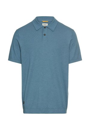 Poloshirt aus leichtem Baumwollmix in Hellblau. Mit Kragen, dreiknöpfiger Knopfleiste, kurzen Ärmeln und dezentem Strukturmuster.