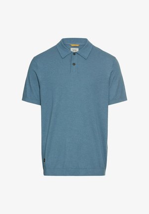 Poloshirt aus leichtem Baumwollmix in Hellblau. Mit Kragen, dreiknöpfiger Knopfleiste, kurzen Ärmeln und dezentem Strukturmuster.