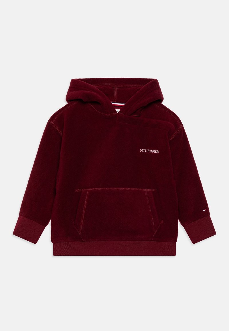 Haut à capuche en polaire bordeaux avec une poche avant, un capuchon avec cordon de serrage et des poignets côtelés. Présente un logo blanc sur la poitrine et une texture lisse.