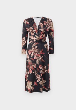 Floral-print dress featuring a dark background, long sleeves, and a deep v-neck, with twisting front detailing and mid-length design.