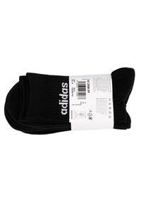 Schwarze Baumwollsocken im Crew-Stil mit weißem adidas-Logo. Verfügen über eine gerippte Textur und ein Etikett an der Seite mit Pflegeanweisungen und Größeninformationen.