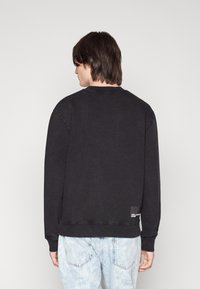 Karl Lagerfeld Jeans REGULAR UNISEX - Sweatshirt - black