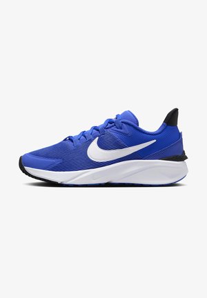 Blue athletic sneakers made of textured mesh, featuring a white Nike swoosh, a cushioned midsole, and a black heel accent.