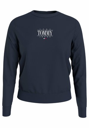 Sweat-shirt bleu marine à manches longues avec "1985 TOMMY JEANS" et un petit logo de drapeau rouge, blanc et bleu centré sur la poitrine.