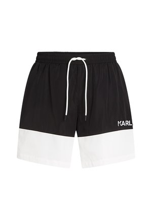 Crne kupaće hlače s bijelom horizontalnom prugom, elastična struk s bijelim vezicom i "KARL" logom s lijeve strane.