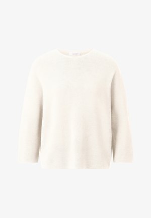 Baltas, minkštas mezginys su apvaliu kaklu, ilgomis rankovėmis ir laisvu siluetu. Pasižymi sklandžia tekstūra ir subtiliu raštu.