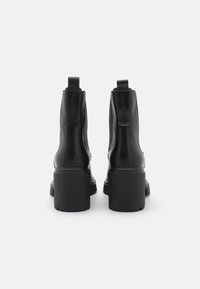 Marc O'Polo STINE  - Platform ankle boots - black