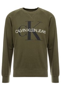 Světle olivový svetr, bavlněný materiál, kulatý výstřih, žebrované manžety a lem, s logem "CALVIN KLEIN JEANS" v černé a bílé barvě.