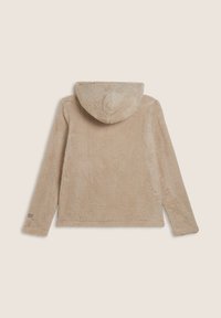 Giacca in pile beige con cappuccio, dalla superficie morbida e testurizzata. Presenta maniche lunghe e rifiniture pulite. Senza accenti o motivi particolari.