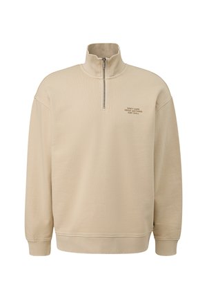 Beige quarter-zip sweatshirt with ribbed cuffs and hem. Features a textured fabric and embroidered text on the left chest area.