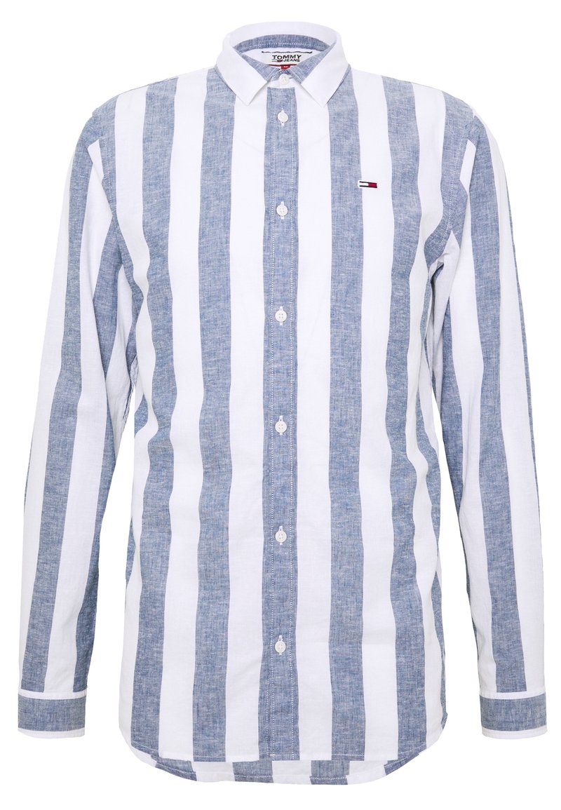 Långärmad skjorta med knappar i breda vertikala blå och vita ränder, en krage och en liten Tommy Jeans-logga på bröstet.