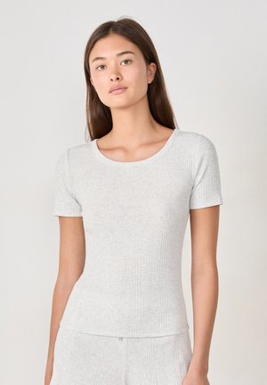 Light grey ribbed t-shirt made from soft fabric, features short sleeves and a rounded neckline, with subtle vertical texture throughout.
