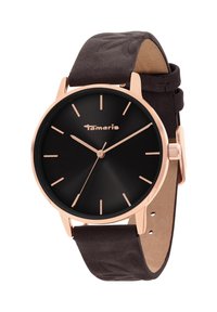 Montre en or rose avec un cadran rond noir, des marqueurs horaires minimalistes et un bracelet en suede marron foncé avec des détails gaufrés.