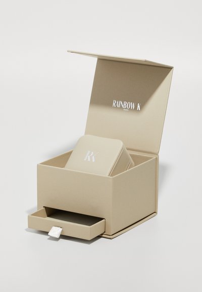 Beige rectangular gift box with a lid, featuring a white "RAINBOW K" logo inside. Includes a smaller beige compartment and a pull-out drawer.