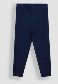 Námornícke modré legíny z jemného a elastického materiálu. Majú elastický pás a slim fit strih, ideálne na bežné nosenie.