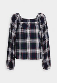 Haut à carreaux à encolure carrée avec manches longues, en tissu léger. Présente des couleurs bleu marine, gris et blanc avec des accents rouges et verts.