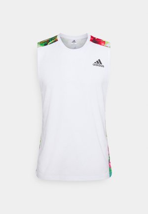 Biała sportowa koszulka Adidas bez rękawów z kolorowymi kwiatowymi akcentami na ramionach i bokach, logo Adidas na lewej piersi.