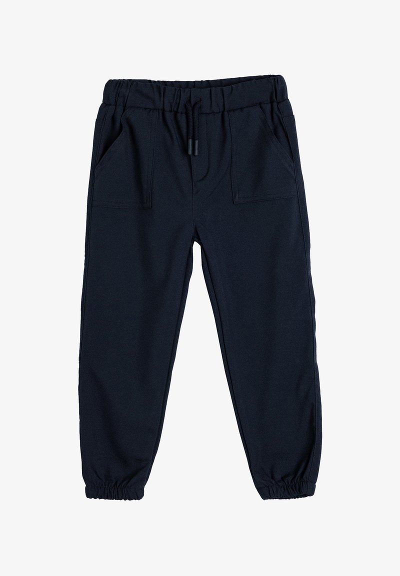 Donkerblauwe sweatpants van zacht katoen, met een elastische tailleband, twee voorzakken en tapering bij de enkels.
