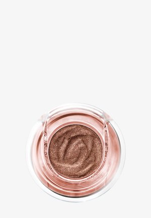 Schimmernder bronzefarbener Creme-Lidschatten in einem klaren runden Behälter mit einer glatten, spiralförmigen Textur im Inneren.