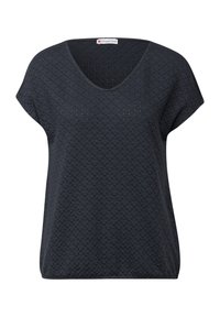 Tmavě šedý top s krátkým rukávem, výstřihem do V a texturovaným vzorem, s malými výřezy. Vyroben z lehkého materiálu s volným střihem.