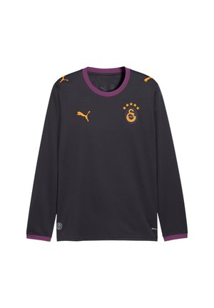 Dunkelgraues Sporttrikot mit langen Ärmeln, lila Kragen und Manschetten, mit orangefarbenen Puma-Logos und einem Fünf-Sterne-Emblem auf der Brust.