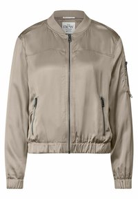 Veste bomber beige avec une texture lisse et brillante. Présente une fermeture éclair à l'avant, un col côtelé, deux poches latérales zippées et des poignets élastiques.