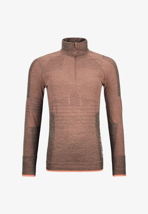 Long-sleeve pullover in rose-brown with a half zip collar, contrasting dark gray accents, textured fabric, and a white logo detail on the side.