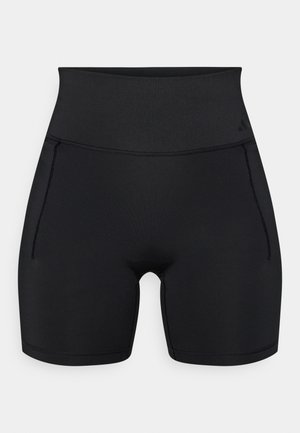 Czarne, wysokiej talii szorty wykonane z gładkiej, elastycznej tkaniny. Posiadają płaskie szwy i boczne kieszenie, zaprojektowane z myślą o komforcie i swobodzie ruchów.