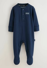 Navyblaues Baby-Overall aus weichem Stoff. Mit langen Ärmeln, Rundhalsausschnitt, Knopfleiste mit drei Knöpfen und fußförmigem Design für Wärme.