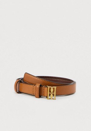 Tan leather belt featuring a narrow design with a gold-tone buckle displaying a stylized letter 'H'. Smooth texture, neatly stitched edges.