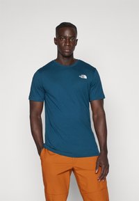 The North Face BOX CELEBRATION TEE - T-shirts med print - midnight petrol