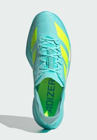 Turquoise athletic shoe with yellow accents and textured upper. Features lace-up design and padded interior. "ADIZERO" branding visible inside.