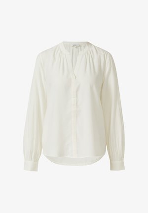 White long-sleeve blouse with a round neckline, button placket, and gathered detail at shoulders. Smooth fabric with a slightly curved hem.