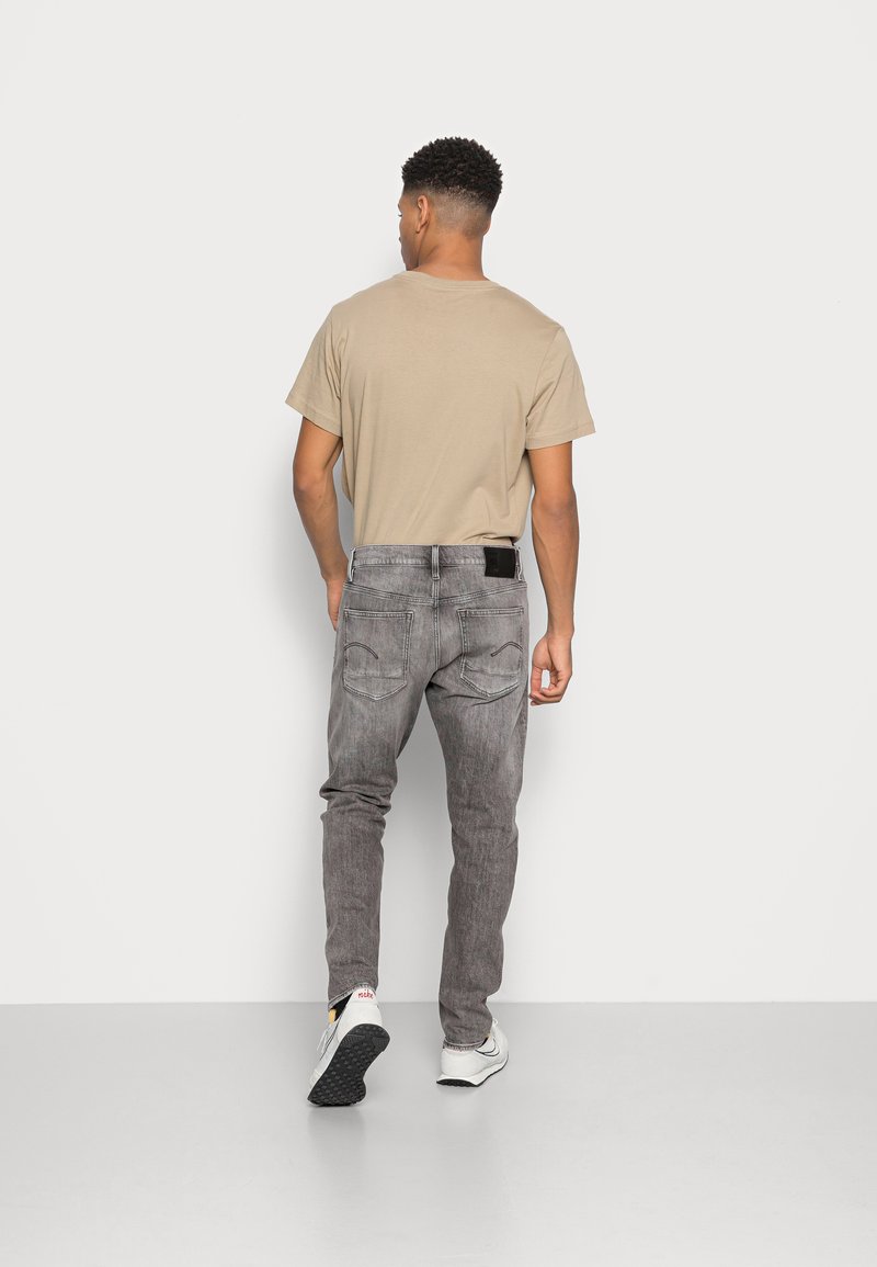 Herren Skinny Fit | G-Star TRIPLE A STRAIGHT Jeans Straight Leg burten black stretch denim faded carbon/grey denim - YO43095 Herren Skinny Fit | G-Star TRIPLE A STRAIGHT Jeans Straight Leg burten black stretch denim faded carbon/grey denim - YO43095