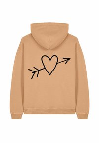 La felpa beige presenta un cuore ricamato nero con un design a freccia sul retro. Ha un cappuccio con cordino e polsini e orlo a coste.