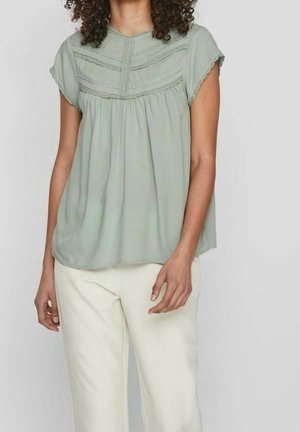 Bluse - mottled green