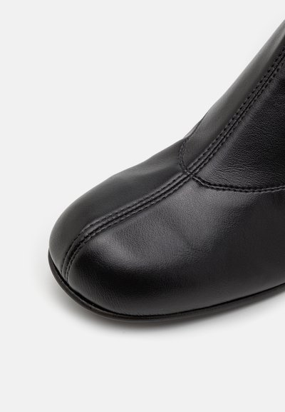 SI ROSSI Cuissardes - black