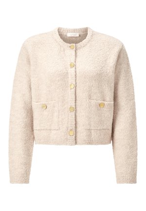 Beige, cropped cardigan made from textured fabric, featuring a round neck, front buttons, and two patch pockets with gold accents.