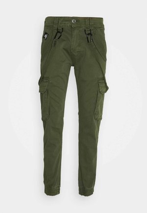 Pantalones cargo de color verde oliva con piernas ajustadas, múltiples bolsillos laterales, correas ajustables y puños elásticos. Fabricados con un tejido duradero.