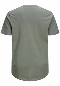 Green cotton T-shirt with short sleeves, a crew neck, and a smooth texture. The back is plain with no visible graphics or designs.