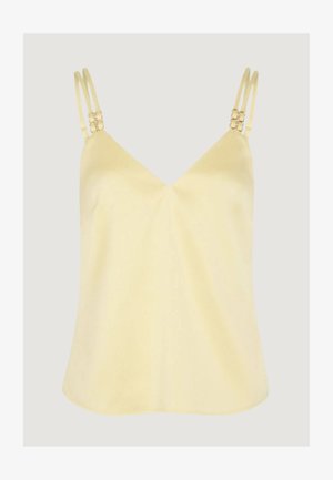 Camisole sans manches jaune pâle avec encolure en V et double bretelles fines ornées de liens décoratifs de couleur or.