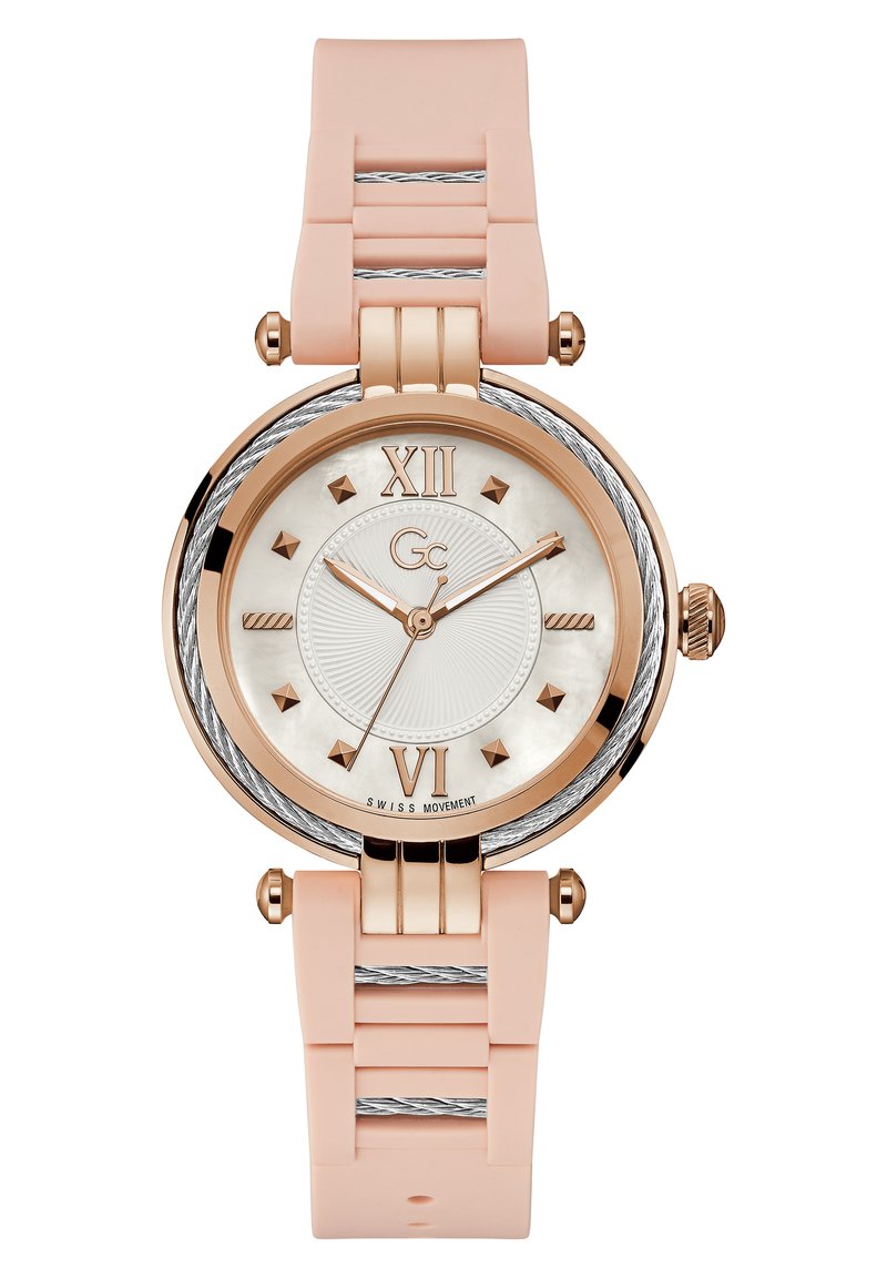 Orologio rotondo con cassa in oro rosa, quadrante in madreperla bianca, cinturino in silicone rosa e finiture in argento. Indicatori alle ore 12 e 6.