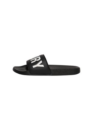 Sandalo nero tipo slide con suola texturizzata e ampia fascia con grandi lettere bianche "RY" sulla fascia.