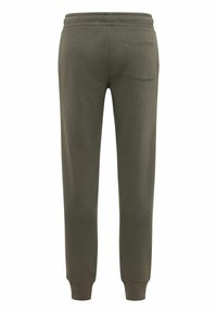 Olivgrüne Jogginghose mit schmaler Passform, elastischem Bund und gerippten Bündchen; verfügt über eine einzelne Gesäßtasche mit flacher Naht.